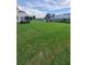 Spacious backyard with green grass and plenty of room for activities at 907 Gloucester Ct, Kissimmee, FL 34758
