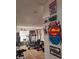 A home gym features a variety of exercise equipment and motivational decor at 907 Gloucester Ct, Kissimmee, FL 34758