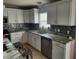 Well-appointed kitchen featuring granite countertops, stainless steel appliances, and ample cabinet space at 907 Gloucester Ct, Kissimmee, FL 34758