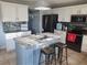 Charming kitchen featuring a granite island and countertop, complemented by stainless steel appliances and ample cabinet space at 907 Gloucester Ct, Kissimmee, FL 34758