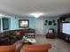 View of the living room featuring a large television at 907 Gloucester Ct, Kissimmee, FL 34758
