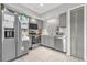 Well-equipped kitchen featuring stainless steel appliances, tile flooring, and plenty of storage at 1225 Coral Coast Dr, Orlando, FL 32824