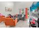 Cozy living room with comfortable seating and natural light streaming through sliding glass doors at 1225 Coral Coast Dr, Orlando, FL 32824