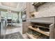 Well-designed kitchen with pull out drawers and modern appliances, seamlessly connecting to dining area at 3704 Via Monte Napoleone Dr, Poinciana, FL 34759