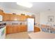 Well-equipped kitchen with plenty of counter space and storage, ideal for cooking and entertaining, with stainless appliances at 423 Corvina Dr, Davenport, FL 33897