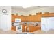 Functional kitchen featuring ample cabinet space, modern appliances, and a convenient layout, making meal prep a breeze at 423 Corvina Dr, Davenport, FL 33897