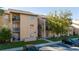 Charming condo building with neutral tones, balconies, well-maintained landscaping, and ample parking at 5226 Via Hacienda Cir # A314, Orlando, FL 32839