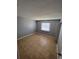 This bedroom features tile floors, natural light from a window, and neutral walls at 5226 Via Hacienda Cir # A314, Orlando, FL 32839