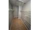 A walk-in closet with shelving and tile flooring providing ample storage space at 5226 Via Hacienda Cir # A314, Orlando, FL 32839