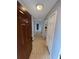 Inviting entryway features neutral walls, ceramic tile floor, and a view through to the rest of the property at 5226 Via Hacienda Cir # A314, Orlando, FL 32839