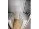 Laundry room features a full size washer and dryer, neutral paint, ceramic tile, and wire shelves at 5226 Via Hacienda Cir # A314, Orlando, FL 32839