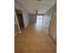 Living Room features ceramic tile flooring and sliding glass doors to the outdoor patio at 5226 Via Hacienda Cir # A314, Orlando, FL 32839