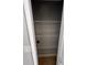 Pantry with multiple wire shelves for ample food and storage, ceramic tile floor, and a light gray wall at 5226 Via Hacienda Cir # A314, Orlando, FL 32839