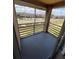 Outdoor patio featuring a black metal railing and views of the surrounding neighborhood at 5226 Via Hacienda Cir # A314, Orlando, FL 32839