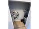 Utility closet featuring white wire shelves, tile flooring, and room for various storage needs at 5226 Via Hacienda Cir # A314, Orlando, FL 32839