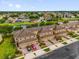 Townhomes with garages and landscaping at 1031 Wood Cv, Kissimmee, FL 34743