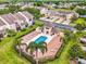 Aerial view of community pool and manicured grounds at 1031 Wood Cv, Kissimmee, FL 34743