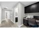 Hallway area with workspace and a view into the half bath at 1031 Wood Cv, Kissimmee, FL 34743