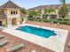 Relax at this community pool with plenty of lounge seating at 1031 Wood Cv, Kissimmee, FL 34743