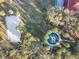Aerial view of amenities including a shuffleboard and sand volleyball court at 1102 Solana Cir, Davenport, FL 33897