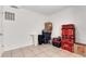 Storage room featuring tile floors, shelving, and storage containers at 1204 Pleasant Pl, Lakeland, FL 33801