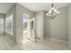 This bright breakfast nook includes a modern chandelier at 1370 Kiawah St, Celebration, FL 34747