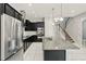Kitchen includes granite countertops, stainless appliances and a central island at 1370 Kiawah St, Celebration, FL 34747