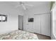 Bedroom with closet and decorative TV at 1821 N Hampton Dr, Davenport, FL 33897