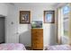 Comfortable bedroom with twin beds and decorative artwork at 1821 N Hampton Dr, Davenport, FL 33897
