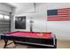 Finished garage provides space for a game area and contains a pool table and a dart board at 1821 N Hampton Dr, Davenport, FL 33897