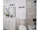 Stylish bathroom boasts a modern vanity, sleek black fixtures, and a shower with beautiful tile surround at 201 La Paz Dr, Kissimmee, FL 34743