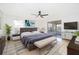 Bright bedroom features a ceiling fan, area rug, and access to a screened-in porch at 201 La Paz Dr, Kissimmee, FL 34743