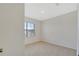 Carpeted bedroom featuring a window with blinds at 2705 Grandbury Grove Rd, Lakeland, FL 33811