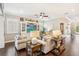 Inviting living room boasts hardwood floors, built-in shelving, and cozy seating for relaxing and entertaining at 2748 Greenlands St, St Cloud, FL 34772