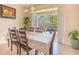 Bright dining room features a large window with views to the exterior patio at 2820 Avian Loop, Kissimmee, FL 34741