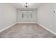 Dining room featuring tile floors, modern lighting fixture, and natural light at 3038 Camden Way, Davenport, FL 33837