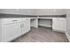 Laundry room featuring white cabinets, countertop and tile flooring at 3038 Camden Way, Davenport, FL 33837
