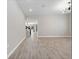 Open concept living room with tile floors and modern fixtures at 3038 Camden Way, Davenport, FL 33837