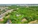 Expansive property surrounded by lush greenery and mature trees near the main road and other community establishments at 3075 Simpson Rd, Kissimmee, FL 34744