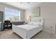 Bright bedroom featuring a large window and neutral decor at 3344 Corona Village Way # 308, Orlando, FL 32835