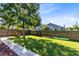 Well-maintained backyard with wooden fencing, outdoor storage, and kayaks for fun activities at 3820 Forest Cir, St Cloud, FL 34772