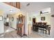 Spacious entryway showcasing high ceilings, wood-look floors, and an open view into the dining area at 3820 Forest Cir, St Cloud, FL 34772