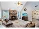Inviting living room with brick fireplace and vaulted ceiling at 3820 Forest Cir, St Cloud, FL 34772