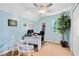 Home office featuring a large window, comfortable chair, and spacious desk and neutral colored carpet at 3820 Forest Cir, St Cloud, FL 34772