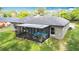 A cozy outdoor patio enhances this house's exterior, complete with a screened-in enclosure at 420 Ketch Rd, St Cloud, FL 34771