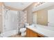Bright bathroom features tile flooring, a shower/tub combo and a large mirror at 4216 Gold Rush Ln, St Cloud, FL 34772