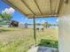 View of fenced-in backyard with storage shed and view of lake, perfect for outdoor relaxation at 4343 Lake Richmond Dr, Orlando, FL 32811