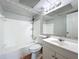 Bathroom with a tub/shower, toilet and single vanity at 4343 Lake Richmond Dr, Orlando, FL 32811