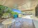 Carport is large with view of house across the street at 4343 Lake Richmond Dr, Orlando, FL 32811