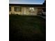 Cozy single-story home with dark shutters and a well-maintained lawn at 4343 Lake Richmond Dr, Orlando, FL 32811
